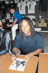 Tony Butler signing
